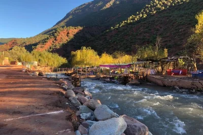 Feel the quiet of morocco’s atlas mountains, wander five valleys, share lunch in a berber home, and travel with a local guide—hotel pickup included for easy booking.