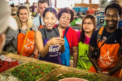 Start your chiang mai cooking class with a lively market visit, hands-on thai & akha recipes, and stories from your akha host. includes hotel pickup & cookbook.