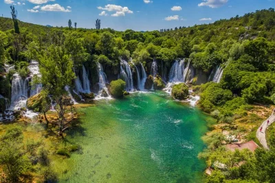 Wake up to the sound of waterfalls at kravice, wander mostar’s cobbled lanes, and climb pocitelj’s medieval tower—all with hotel pickup and a local guide.