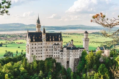Feel the magic of neuschwanstein castle with skip-the-line entry, carriage ride, and marienbrücke views. includes pickup in hohenschwangau and local guide.