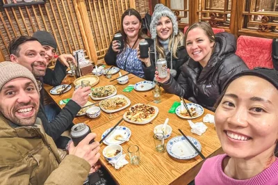 Start your beijing hutong food tour with a local guide, taste spring pancakes, hotpot, and craft beer at family-run spots. includes dinner and drinks.