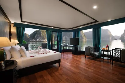 Wake to sunrise on halong bay, kayak lan ha’s caves, join a vietnamese cooking class, and relax in a private balcony suite. includes pickup from hanoi hotels.