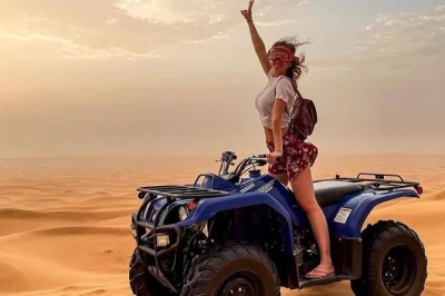 Feel the rush of dubai’s red dunes with quad biking, dune bashing, camel rides, and a bbq dinner under desert stars. includes hotel pickup and live shows.