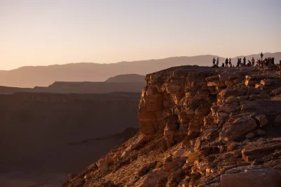 Feel the colors shift at valle de la luna, wander wild rock formations, and share sunset drinks with locals—includes snacks, guide, and san pedro pickup.