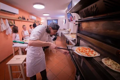 Feel the warmth of a real florence kitchen as you make pizza from scratch, watch gelato crafted live, and share laughs with a local chef. includes lunch & digital recipes.