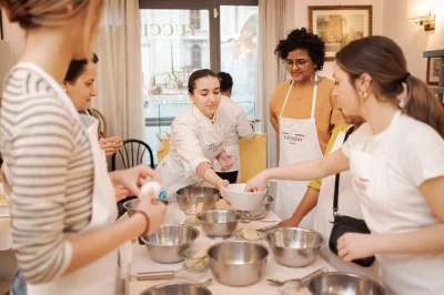 Roll up your sleeves in rome’s piazza navona, making pasta and tiramisu with local chefs. includes hands-on class, appetizers, drinks & dessert you create.