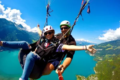 Feel the rush of tandem paragliding in interlaken, soaring above the alps with a local guide. includes transport, equipment, and insurance for a worry-free flight.