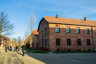Step quietly through auschwitz-birkenau with a local guide, hotel pickup from krakow, and small group transport. includes entry, headphones, and return drop-off.