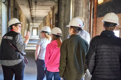 Step into ellis island’s abandoned hospital with a hard hat tour. walk eerie corridors, see jr’s art, hear immigrant stories—includes guide & exclusive entry.