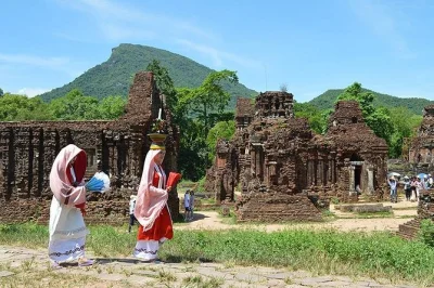 Step into my son sanctuary at sunrise, watch cham dance, try your hand at phở noodle making, and float the thu bon river—includes pickup and lunch.