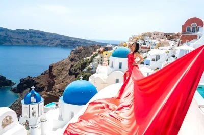 Feel the breeze in a flying dress as a local photographer guides you through santorini’s blue domes. includes private transport, dress options, and edited photos.
