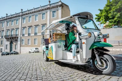 Feel the pulse of lisbon on a private tuk tuk tour through alfama, belém and city viewpoints. includes city center pickup, blankets and a local storyteller guide.