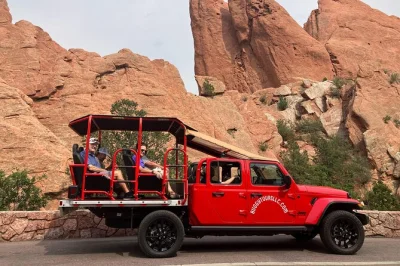 Feel the red rocks up close on a garden of the gods jeep tour with stops at waterfalls, mineral springs in manitou, and castle views. includes snacks and local guide.