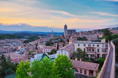 Step through girona’s medieval streets, taste xuixo pastry in the jewish quarter, and hear wild legends with a local guide. includes food tastings and stories.