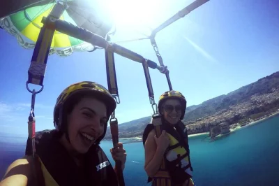 Feel the wind over calabria’s turquoise sea on a double parasailing flight above tropea’s coast. small group, with all gear included & takeoff from the boat.