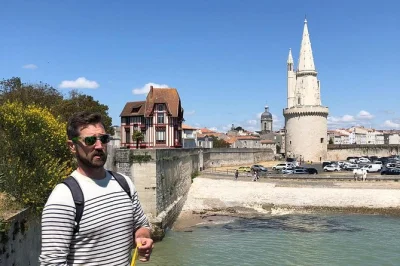 Feel the spirit of la rochelle on a walking tour with a local guide, explore historic towers, taste regional specialties, and get insider tips for your stay. includes guided walk.