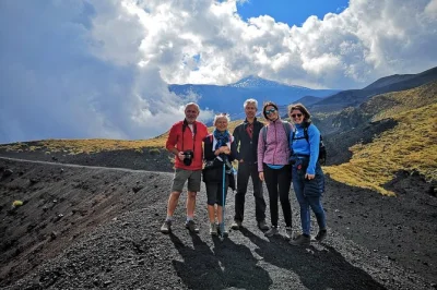 Step onto etna’s wild north side, hike the 2002 eruption craters, see buried ruins, and walk lava fields with a volcanological guide. includes insurance.