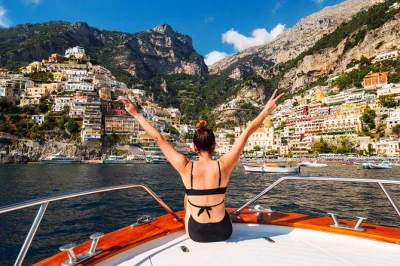 Glide from sorrento along the amalfi coast by boat, with swimming stops, free time in amalfi & positano, and hotel pickup included. small-group, relaxed pace.