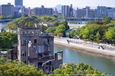 Walk through hiroshima’s peace memorial park, meet wild deer on miyajima island, and see the floating torii gate with a local guide—entry fees and transport included.
