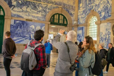 Wander porto’s medieval streets, see são bento’s blue tiles, peek into livraria lello, and end with a port wine toast. includes guide and all fees.