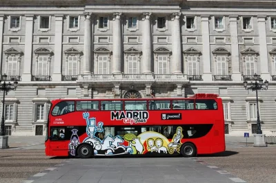 Feel madrid’s rhythm on a double-decker city bus, switch routes anytime, join a guided walking tour, and see the city glow on the night route—all with one ticket.