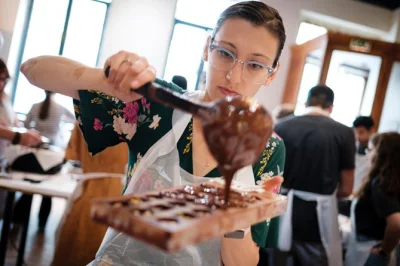Step into bruges for a hands-on belgian chocolate workshop, make your own pralines from scratch, sip real hot chocolate, and take home 30+ chocolates in a golden box.