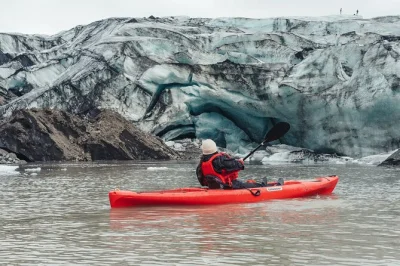 Feel the quiet thrill of kayaking among icebergs on sólheimajökull glacier lagoon, with expert guide, all gear, and dry suit included. book your iceland adventure.