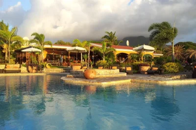 Slow down with a palms court gardens day pass in st kitts—swim in the infinity pool, explore lush gardens, and enjoy lunch at the on-site restaurant. includes access to all facilities.