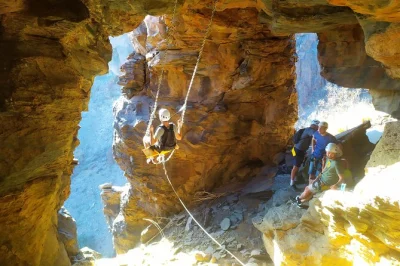 Feel the thrill on gran canaria’s via ferrata—climb iron steps, explore caves, cross a 60m bridge, and finish with the island’s highest swing. includes gear & snacks.