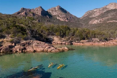 Feel the rhythm of freycinet’s waters on a guided sea kayak tour, paddle past pink granite peaks, share stories with locals, and pause for coffee on a quiet beach.