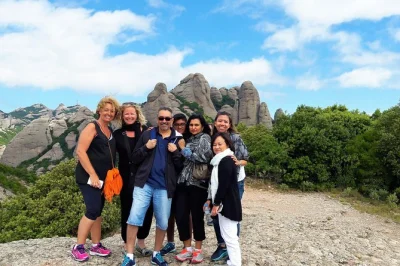 Hear the choir at montserrat monastery, hike to st michael’s cross, and stroll sitges’ old town on a small-group day trip from barcelona with guide and transport.