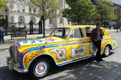 Feel the spirit of liverpool with a beatles tour in a replica of john lennon’s rolls royce, stroll penny lane & strawberry field, and explore with a local guide.