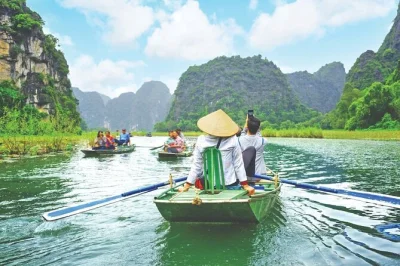 Feel the pulse of ninh binh on a tam coc boat ride, climb mua cave for sweeping views, explore ancient hoa lu, and enjoy a local buffet lunch with pickup from hanoi.