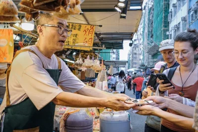 Step into hong kong’s kowloon markets with a local guide, taste fresh pastries and overnight fruit, and explore hidden upstairs shops. includes food tastings.