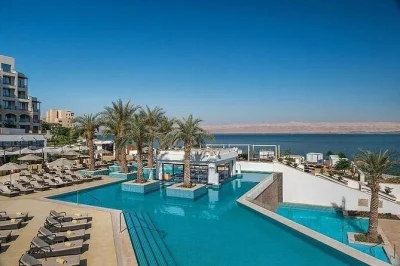 Relax at the dead sea on a full day tour from amman. float in mineral-rich waters, enjoy resort access, and shop for local mud and salt products.