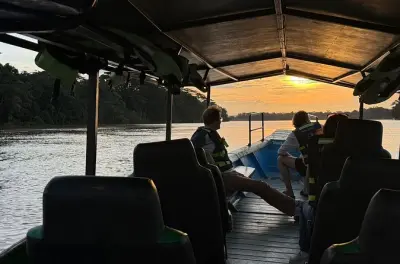 Tambopata River boat tour: Wildlife sunset bilingual guide