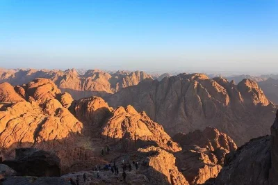 Climb moses mountain at night from dahab, watch sunrise, and visit st. catherine's monastery. includes breakfast, transfers, and bedouin guide.