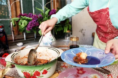 Explore tbilisi’s dezerter bazaar with a local, cook georgian dishes, and share a home meal. private, hands-on experience with authentic flavors.