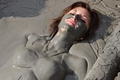 Soak in the warm mud of totumo volcano near cartagena, guided by locals, with hotel pickup, a traditional snack, and all transport included for a laid-back escape.