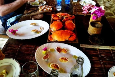 Explore malindi markets, canoe to robinson island for lunch, and walk marafa hell's kitchen canyon at sunset. private guide, transport, and lunch included.