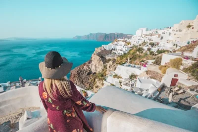 See oia’s blue domes, profitis ilias views, black beach, and a wine museum on this private santorini tour. hotel pickup and local guide included.