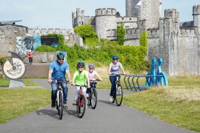 Feel the wind along cork’s greenway by bike, pause for coffee at passage west, explore blackrock castle or ferry to cobh—includes bike, helmet, and local tips.