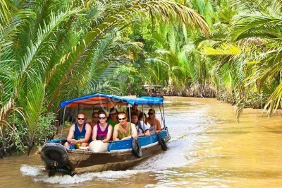 Discover the mekong delta with a private guide, boat ride, and local lunch. visit ben tre’s fruit orchards, coconut candy workshop, and floating markets. book now—includes port pickup.