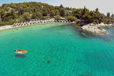 Discover sithonia on a private day tour from thessaloniki. swim at kalogria beach, stroll parthenonas village, and taste local wine at porto karras.
