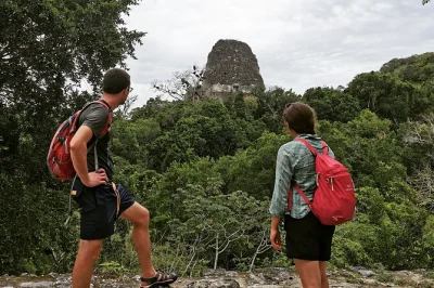 Walk ancient mayan temples at tikal with a local guide. includes park entry, hotel pickup, and lunch. book your tikal day tour from san ignacio today.