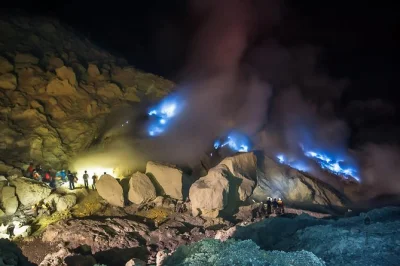 See the blue fire at kawah ijen on a private midnight tour with local guide, gas mask, and hotel pickup. includes sunrise view and waterfall stop.