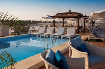 Drift over luxor at sunrise in a hot air balloon, cruise the nile to aswan with an egyptologist guide, and explore ancient temples. includes pickup & meals.