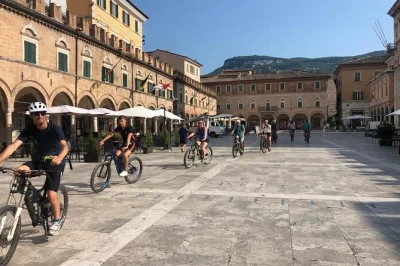 Discover ascoli piceno by e-bike with a certified guide. ride through historic squares, secret alleys, and enjoy unique city views. e-bike rental extra.