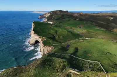 Wharariki Beach day trip from Nelson: Walk to sea caves