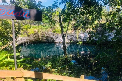 Jump into blue lagoon and el dudu cenote, zipline over turquoise water, meet local animals, and enjoy a beach lunch—includes hotel pickup from puerto plata.